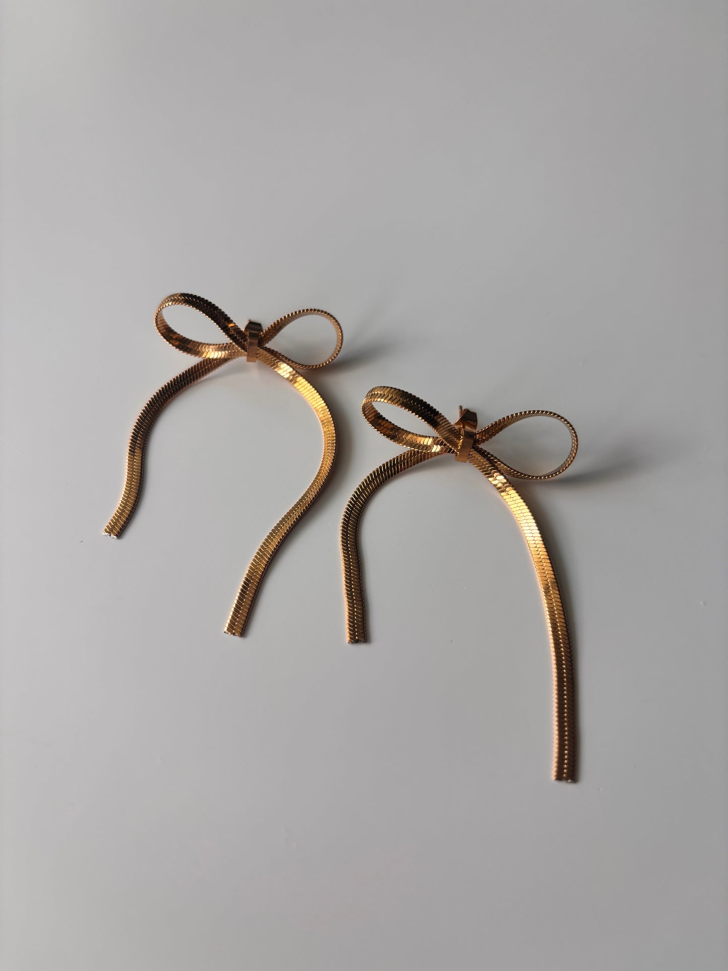 Rita Dangling Bow Earrings